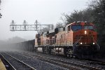 Ballast train rolls west through the station